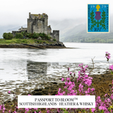 A scenic photograph of a stone castle on a small island by the water, with misty mountains in the background and pink flowers in the foreground. A postage stamp design appears in the top right corner, and a white label at the bottom reads 'PASSPORT TO BLOOM ™ SCOTTISH HIGHLANDS - HEATHER & WHISKY'.